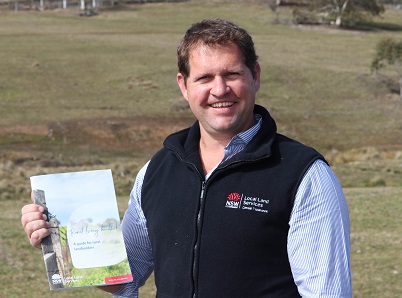 Local Land Services officer Pete Evans with the Rural Living Handbook